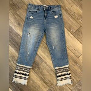 Women's Blue Distressed Jeans with Embellished Hem. Size 30